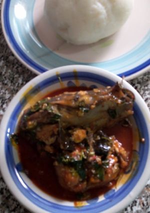 A picture of Pounded Yam and fresh fish soup.