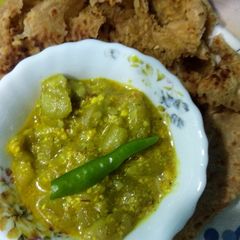 A picture of Bhujia paratha with dahi torai.