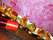 A picture of side dish of potatoes for drumsticks