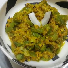 Jhinge narkol posto /ridge gourd in coconut and poppy seed paste A picture of Jhinge narkol posto /ridge gourd in coconut and poppy seed paste.