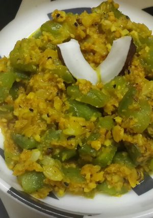 A picture of Jhinge narkol posto /ridge gourd in coconut and poppy seed paste.