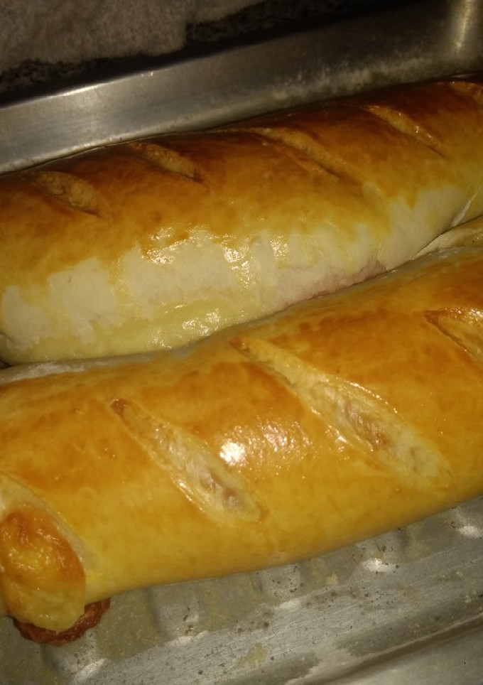 Una foto de Pan de jamón y queso