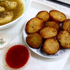 A picture of Baked potato with peshawri chicken soup.