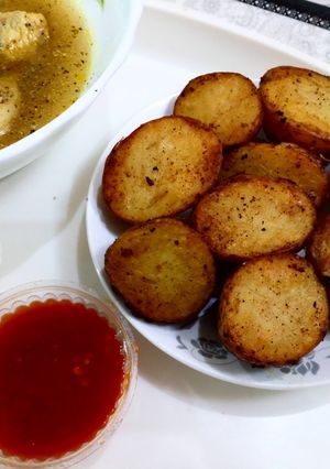 A picture of Baked potato with peshawri chicken soup.
