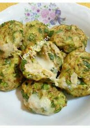 A picture of Baked zucchini with cheese.