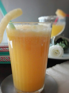 Una foto de Smoothie de piña, nectarina y naranja