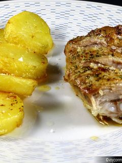 Una foto de Costilla de cerdo al horno con patatas