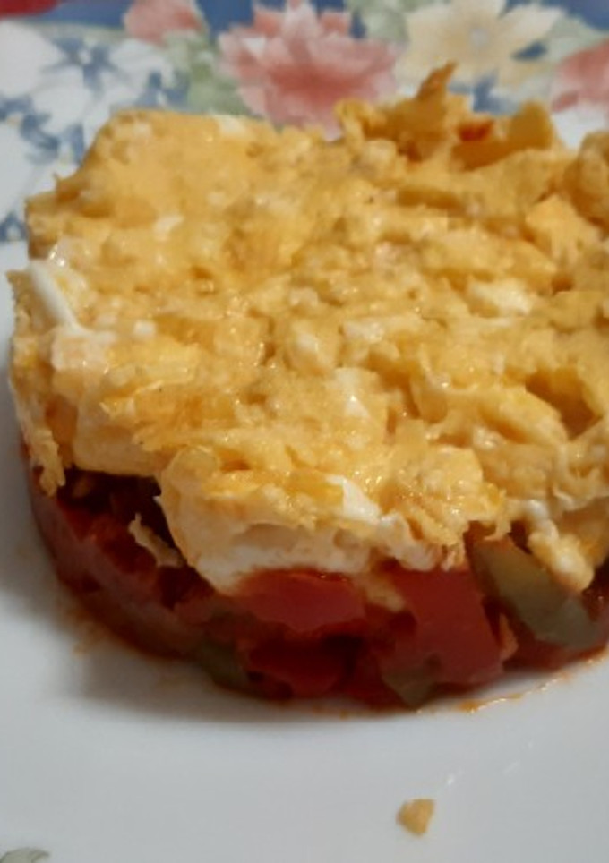 Una foto de Huevos revueltos con fritada de pimientos y jamón