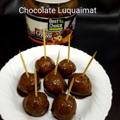 Chocolate Luquaimat Arabic Sweet Dumplings A picture of Chocolate Luquaimat Arabic Sweet Dumplings.