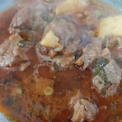 A picture of Potato matar gosht.