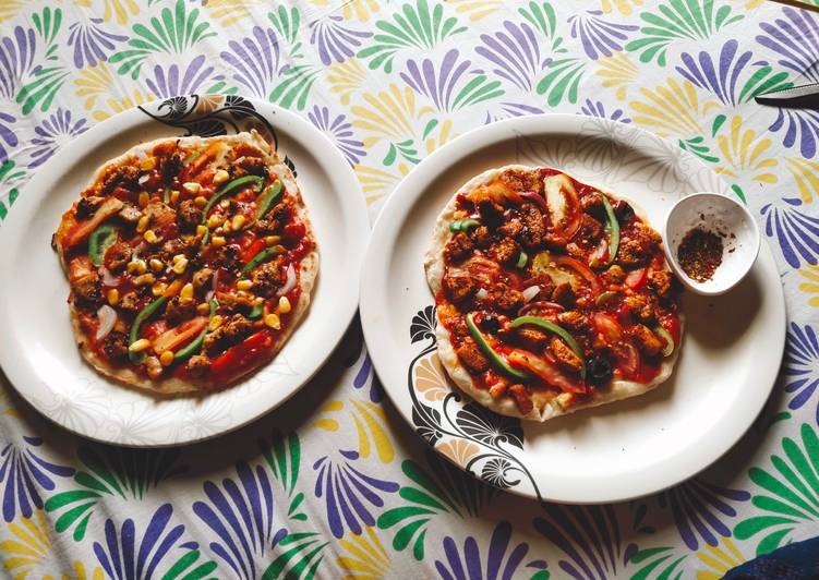 Pepper chicken and peri peri chicken pizza