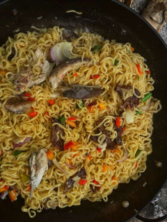 A picture of Noodles with fish.