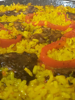 Una foto de Arroz con conejo