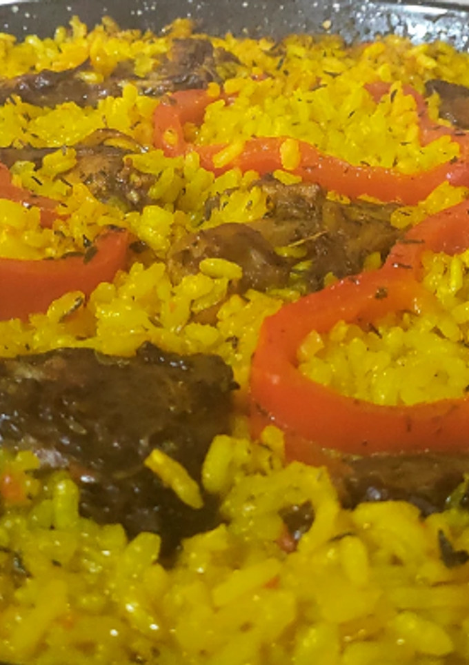 Una foto de Arroz con conejo