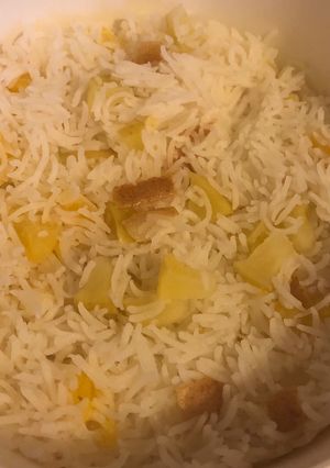 A picture of Fruit Rice with Poached Salmon.