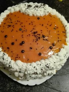 Una foto de Tarta de crema de naranja