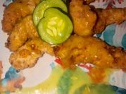 A picture of juicy chicken breast with sauce