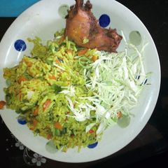 A picture of Mixed veggies tumeric rice.