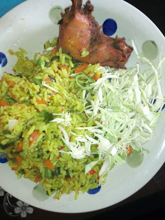 A picture of Mixed veggies tumeric rice.