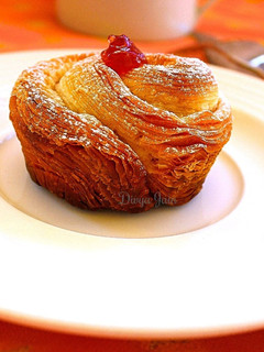 A picture of Almond and Raspberry Cruffins.