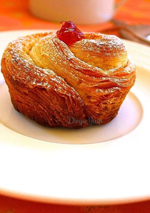 A picture of Almond and Raspberry Cruffins.