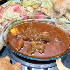 A picture of Alu Gosht Shorba.