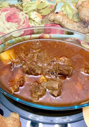 A picture of Alu Gosht Shorba.