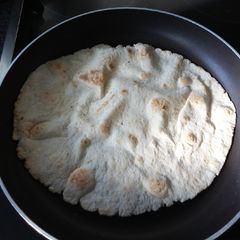 A picture of Soft & Moist Flatbreads with 5 Ingredients, 🤗🍞🌮🍅🧀🥤🍹🍷.