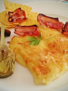 Una foto de Puré de patatas gratinado con bacon