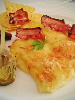Una foto de Puré de patatas gratinado con bacon