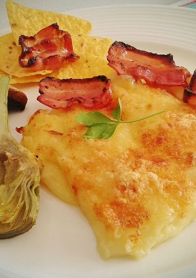 Una foto de Puré de patatas gratinado con bacon
