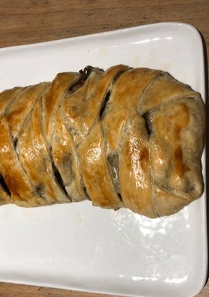 Une photo de Tresse au poulet, champignons et comté