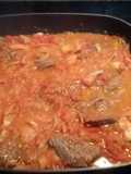 Bistec encebollado con tomate