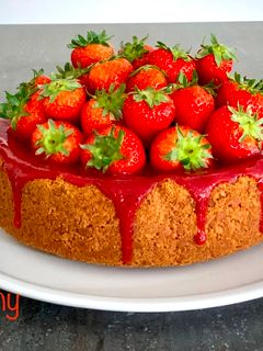 Foto di New york cheesecake con coulis di fragole