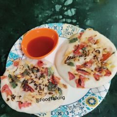 A picture of Tomato Onion Mini Uttapam.