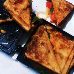 A picture of Veggie cheggie Grill Masala Toast.