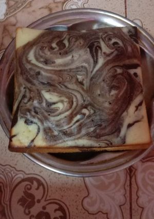 A picture of Marble cake 🎂 on stove.