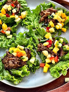A picture of Caribbean Wagyu Beef Lettuce Wraps.