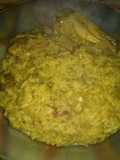 Arroz amarillo con menudos y alitas