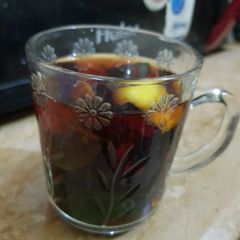 A picture of Black tea with lemon & mint.