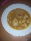 Guiso de fabes con conejo al horno