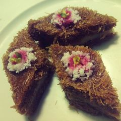 KUNAFA with COCONUT -(fusion of middle eastern desserts) A picture of KUNAFA with COCONUT -(fusion of middle eastern desserts).