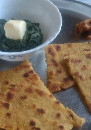 A picture of Sarson sag and makki roti.
