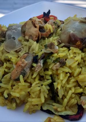 Una foto de Paella de mariscos pero de risottos (algo distinto)