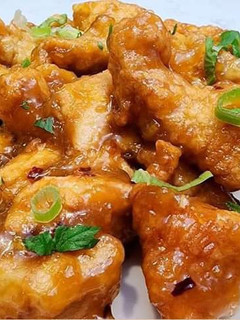 Una foto de Pollo agridulce con salsa de naranja 😋