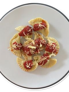 Une photo de Ravioles au poulet et au pesto