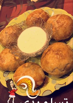 صورة لوصفة اوزي بالفريكة والدجاج والبازيلا