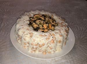 Una foto de Molde de arroz con garbanzos y choritos