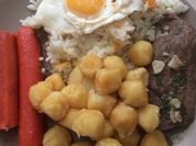 Una foto de guarniciones para bistec