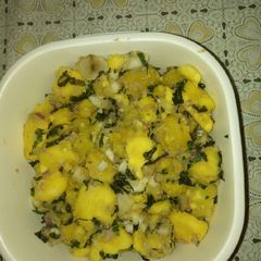 A picture of Sweet potatoes with mint leaves.